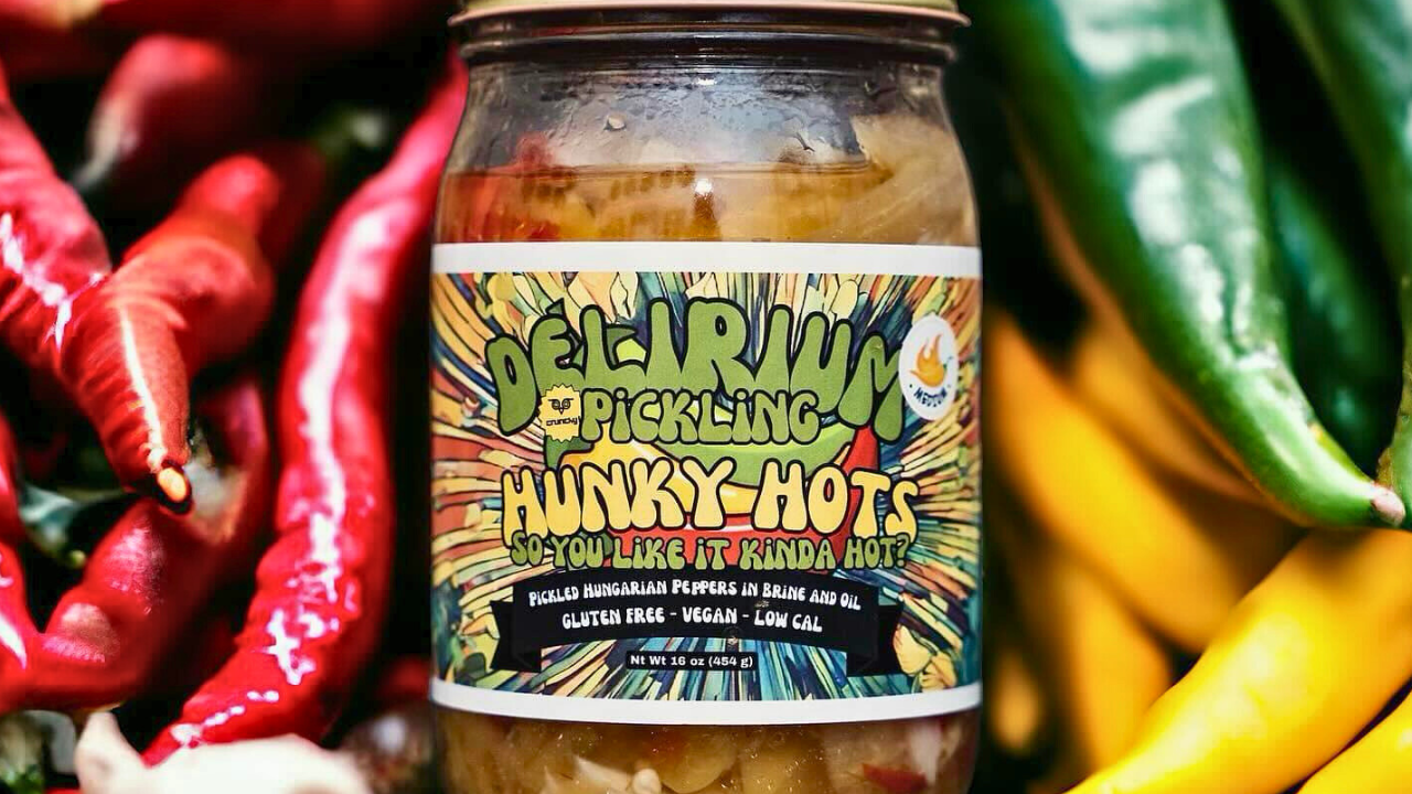 Jar of Delirium Pickling “Hunky Hots” pickled Hungarian peppers in oil and brine, gluten-free artisan Hungarian wax peppers from Trumbull County food trail