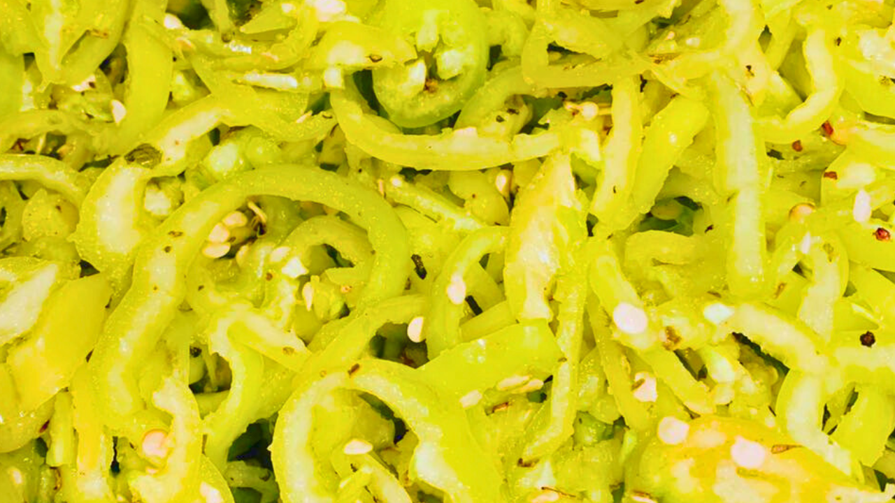 Close-up of sliced hot peppers in oil, a traditional Italian delicacy featured on Trumbull County’s Italian Food Trail in Northeast Ohio.